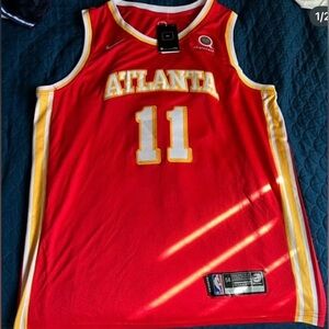 😎PRICE REDUCTION Nike Red and Yellow Atlanta Jersey